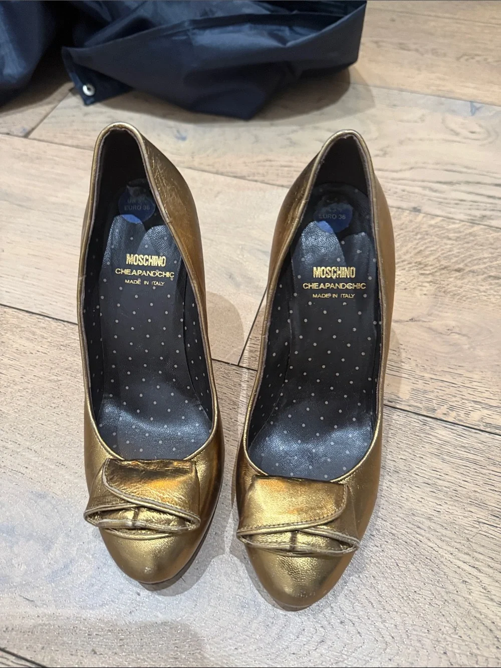 Moschino Metallic Gold Leather Bow Flats